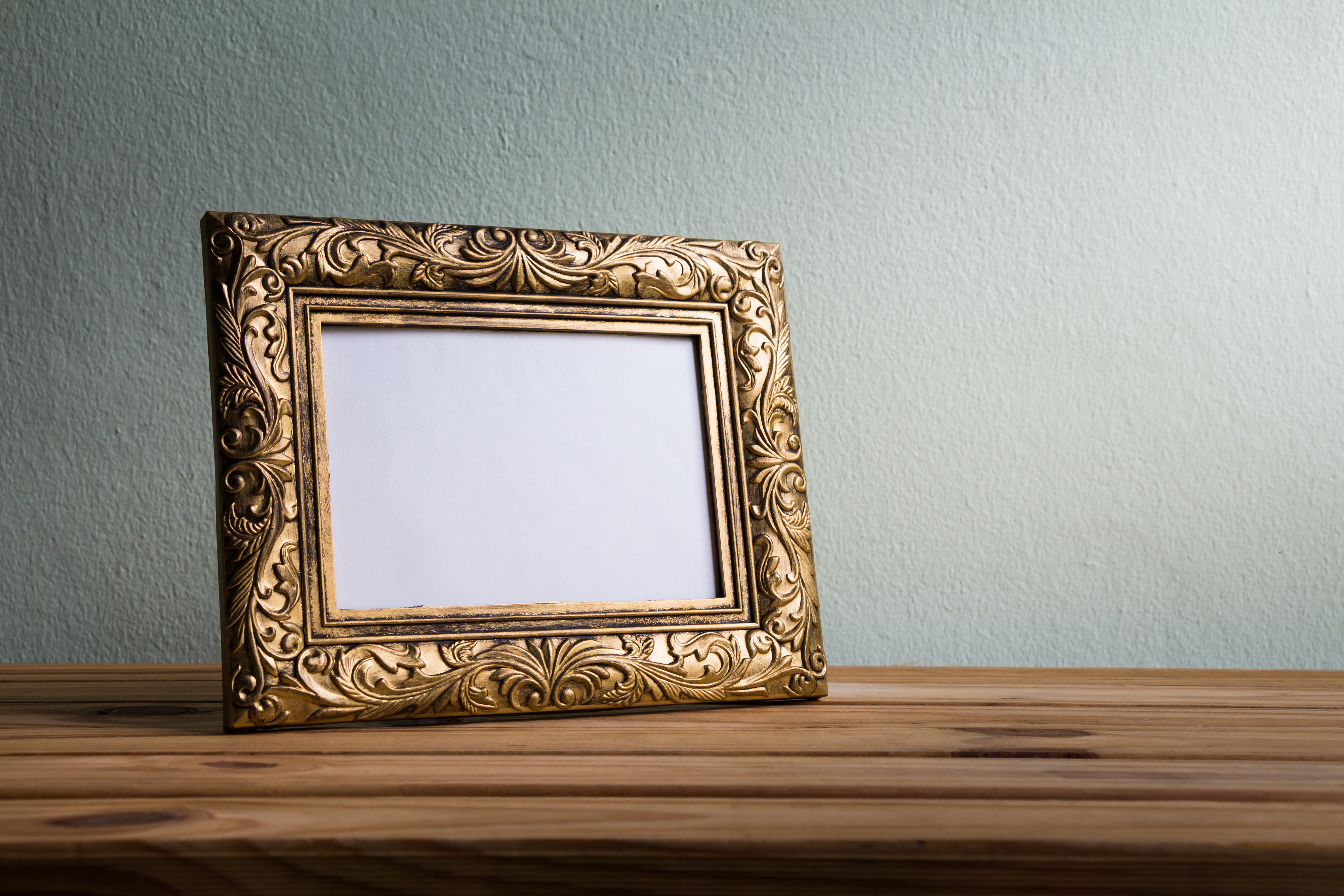 A product photo of a picture frame placed on a counter top